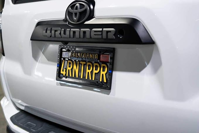 TACTILIAN American Flag License Plate Frame - Subdued 3D Embossed USA Flag in Black Gloss on Matte Finish for Car, Truck or SUV (Thin Blue Line)